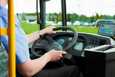 Person driving school bus