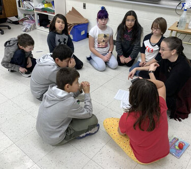 picture of students in a circle