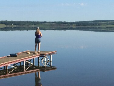 Picture of someone looking at a lake